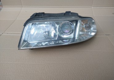 Lampa przednia lewa ze soczewką(silniczek regulacji) Audi A4 B5 FL 1997-2001 Koszalin