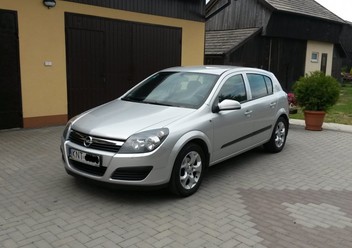 Zamek pokrywy silnika Opel Astra J